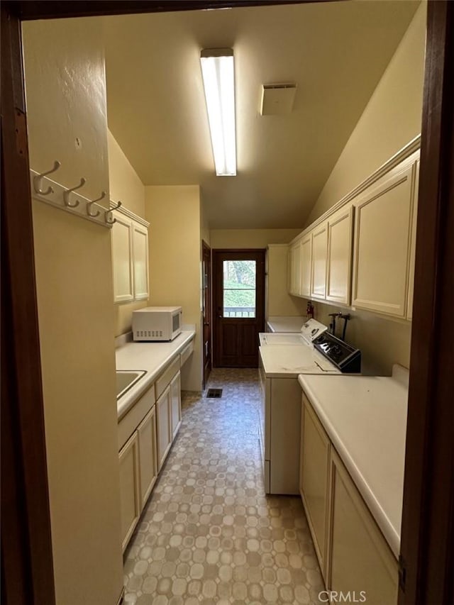 50771 Woodside Ln, Oakhurst, CA 93644 - washroom with cabinet space and washer and dryer