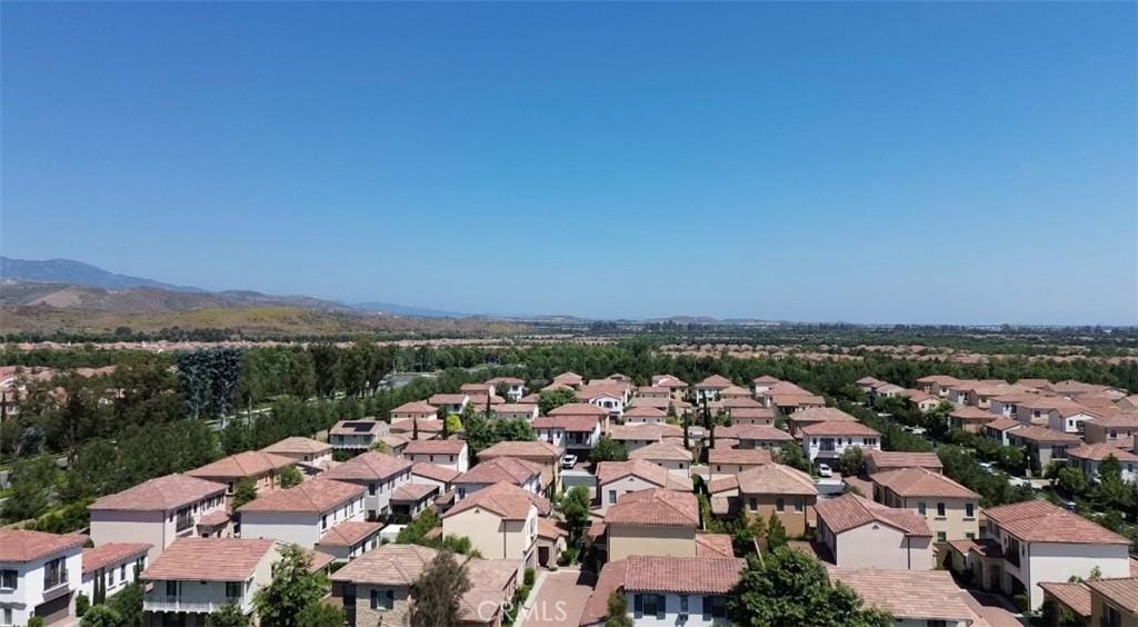 80 Quill, Irvine, CA 92620 - aerial perspective of suburban area with a mountainous background