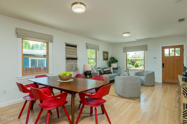 1828 Woodrow Ave, Los Angeles, CA 90041 - dining room featuring light wood finished floors and baseboards