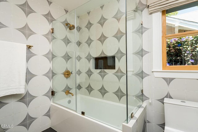 1828 Woodrow Ave, Los Angeles, CA 90041 - full bathroom featuring shower / bath combination with glass door, tile walls, and toilet