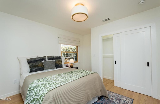 1828 Woodrow Ave, Los Angeles, CA 90041 - bedroom featuring light wood-type flooring, baseboards, and a closet
