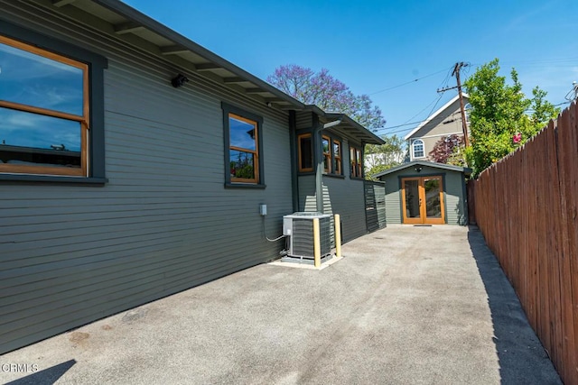 1828 Woodrow Ave, Los Angeles, CA 90041 - view of side of home with central AC, a patio, and an outbuilding