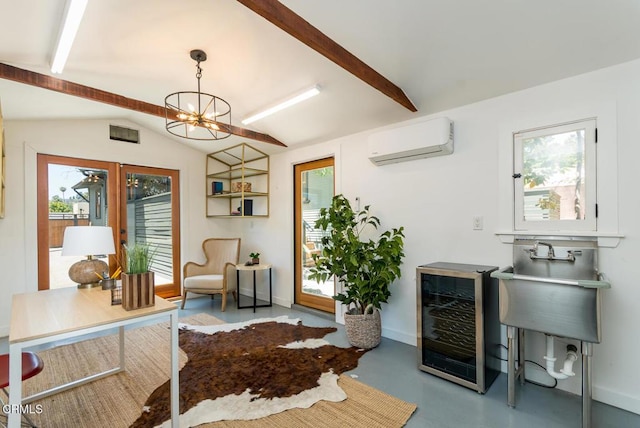 1828 Woodrow Ave, Los Angeles, CA 90041 - office featuring an AC wall unit, beverage cooler, concrete floors, a chandelier, and plenty of natural light