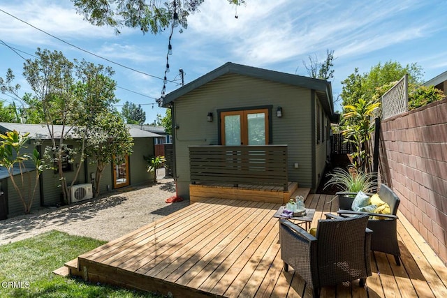 1828 Woodrow Ave, Los Angeles, CA 90041 - rear view of property featuring french doors, a deck, a fenced backyard, and ac unit