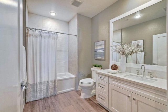 800 Grand Ave Unit 205, Carlsbad, CA 92008 - full bath featuring shower / tub combo, vanity, toilet, and wood finished floors