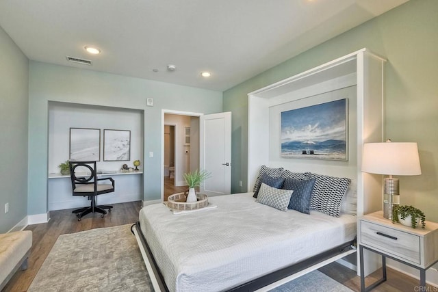 800 Grand Ave Unit 205, Carlsbad, CA 92008 - bedroom with wood finished floors, a desk, baseboards, and recessed lighting