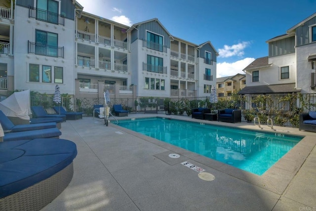 800 Grand Ave Unit 205, Carlsbad, CA 92008 - community pool featuring a patio area and outdoor lounge area