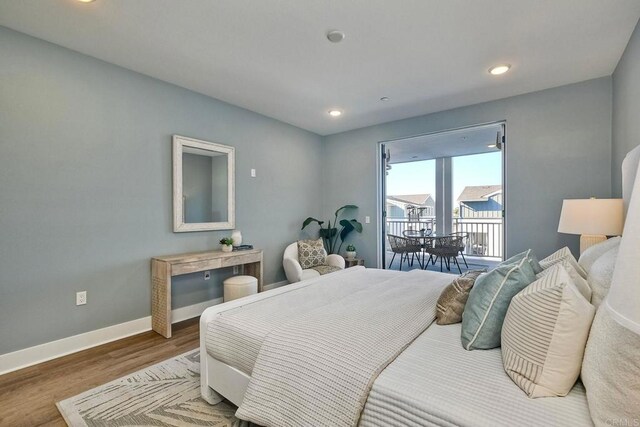 800 Grand Ave Unit 205, Carlsbad, CA 92008 - bedroom featuring access to exterior, wood finished floors, and recessed lighting
