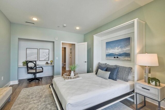 800 Grand Ave Unit 205, Carlsbad, CA 92008 - bedroom with wood finished floors, a desk, and recessed lighting