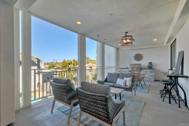 800 Grand Ave Unit 205, Carlsbad, CA 92008 - sunroom featuring a chandelier