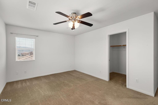 953 Coronado Cir, Santa Paula, CA 93060 - unfurnished bedroom with carpet floors, a spacious closet, baseboards, a closet, and ceiling fan