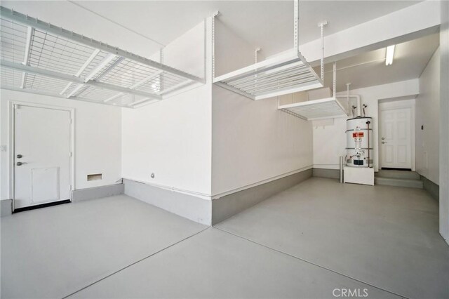 25422 Magnolia Ln, Stevenson Ranch, CA 91381 - garage with strapped water heater