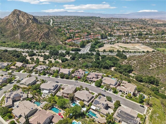 25422 Magnolia Ln, Stevenson Ranch, CA 91381 - aerial view of property's location featuring nearby suburban area and mountains
