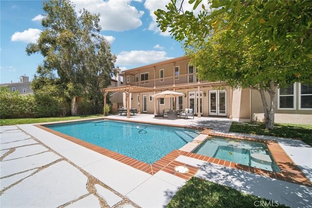 25422 Magnolia Ln, Stevenson Ranch, CA 91381 - view of pool with french doors, a patio, a pergola, and a pool with connected hot tub