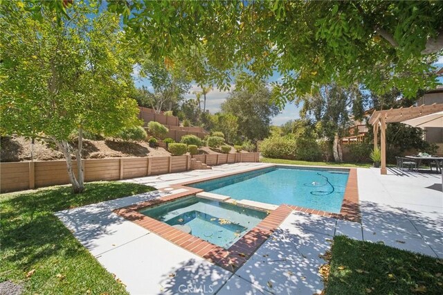 25422 Magnolia Ln, Stevenson Ranch, CA 91381 - view of pool with a patio area, a fenced backyard, and a pool with connected hot tub