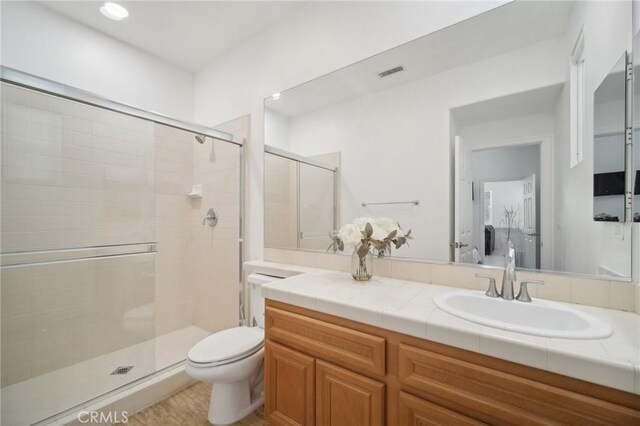 25422 Magnolia Ln, Stevenson Ranch, CA 91381 - full bathroom with a shower stall, toilet, and vanity