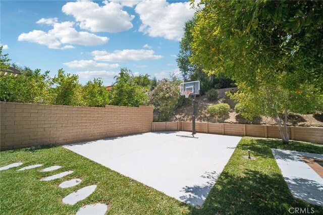 25422 Magnolia Ln, Stevenson Ranch, CA 91381 - view of basketball court featuring basketball hoop