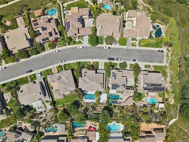 25422 Magnolia Ln, Stevenson Ranch, CA 91381 - aerial overview of property's location with a pool area and nearby suburban area
