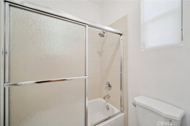 25422 Magnolia Ln, Stevenson Ranch, CA 91381 - full bathroom featuring toilet and bath / shower combo with glass door