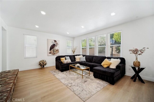 25422 Magnolia Ln, Stevenson Ranch, CA 91381 - living area with light wood finished floors, baseboards, and recessed lighting