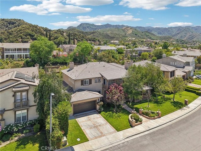 25422 Magnolia Ln, Stevenson Ranch, CA 91381 - aerial view of residential area featuring a mountainous background