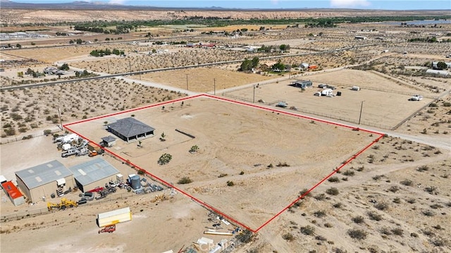 22489 Sweet Pea Rd, Oro Grande, CA 92368 - view of rural area with a desert landscape, property boundaries highlighted, and a mountainous background