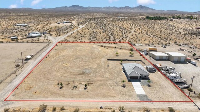 22489 Sweet Pea Rd, Oro Grande, CA 92368 - view of rural area featuring a desert landscape, property parcel outlined, and a mountainous background