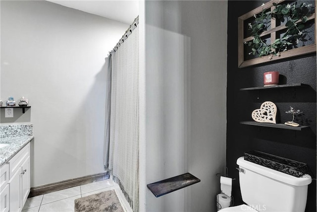 22489 Sweet Pea Rd, Oro Grande, CA 92368 - full bathroom with toilet, tile patterned flooring, vanity, and curtained shower