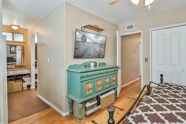 3738 Danmont Ct, Newbury Park, CA 91320 - bedroom featuring baseboards, light wood finished floors, a closet, and ceiling fan
