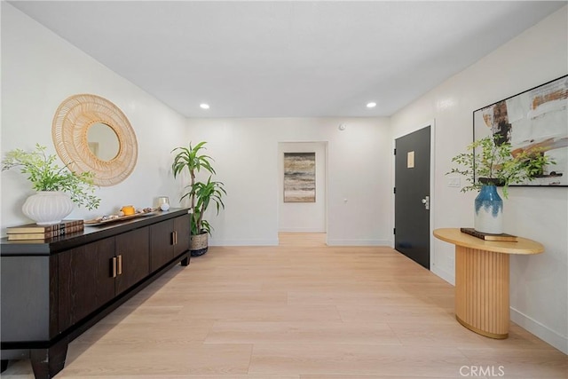 3825 Welland Ave, Los Angeles, CA 90008 - corridor with recessed lighting, light wood finished floors, and baseboards