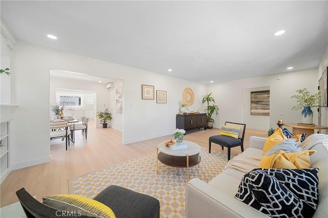 3825 Welland Ave, Los Angeles, CA 90008 - living area with light wood finished floors and recessed lighting