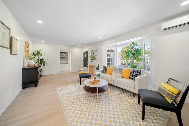 3825 Welland Ave, Los Angeles, CA 90008 - living room featuring light wood finished floors, an AC wall unit, recessed lighting, and baseboards