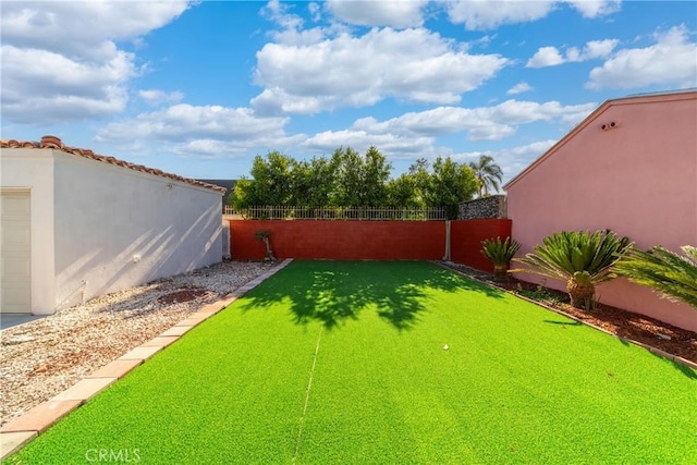 3825 Welland Ave, Los Angeles, CA 90008 - view of yard featuring an area to practice putting and a garage
