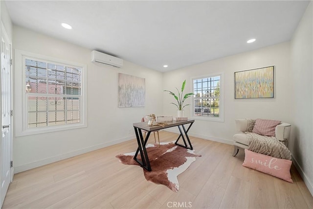 3825 Welland Ave, Los Angeles, CA 90008 - home office with a wall unit AC, light wood finished floors, recessed lighting, and baseboards