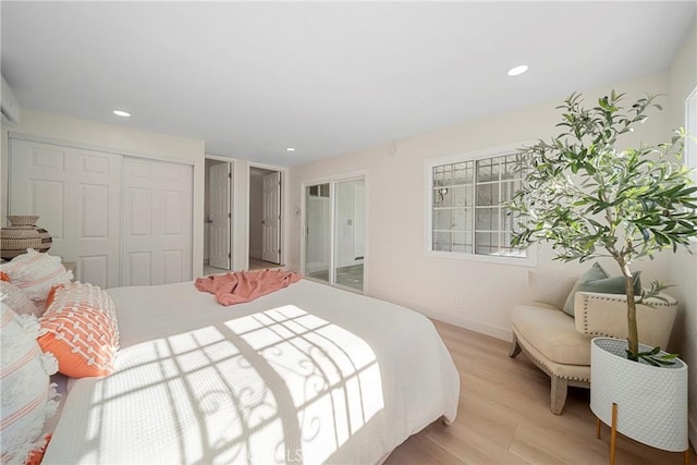 3825 Welland Ave, Los Angeles, CA 90008 - bedroom featuring a closet, light wood-style floors, recessed lighting, and baseboards