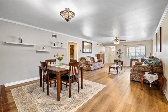 12713 16th St, Chino, CA 91710 - dining room with light wood-style floors, ceiling fan, crown molding, and baseboards