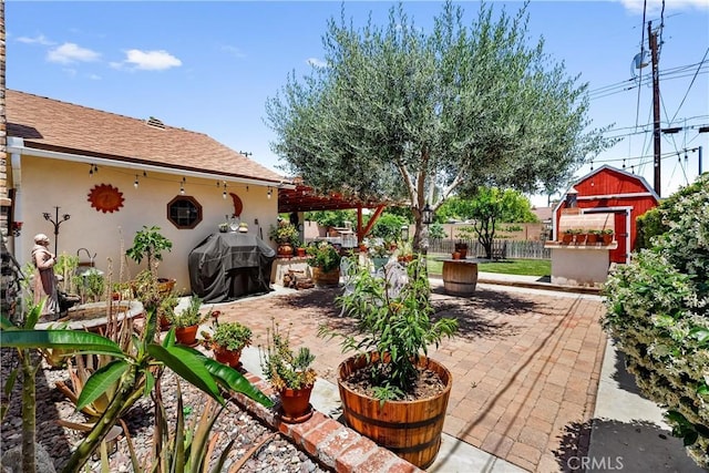 12713 16th St, Chino, CA 91710 - view of patio featuring an outbuilding