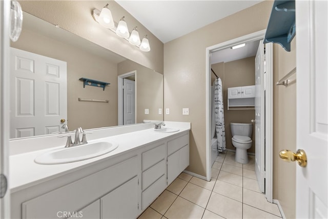 24030 Colmar Ln, Murrieta, CA 92562 - full bath featuring double vanity, tile patterned flooring, toilet, and baseboards
