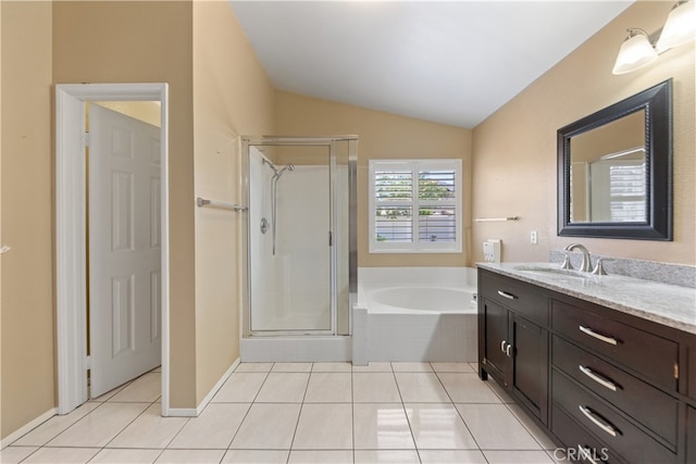 24030 Colmar Ln, Murrieta, CA 92562 - bathroom with vanity, a garden tub, vaulted ceiling, tile patterned flooring, and a shower stall
