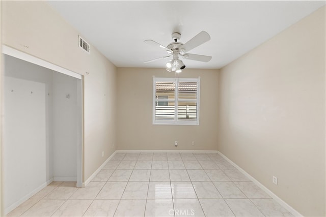 24030 Colmar Ln, Murrieta, CA 92562 - spare room featuring ceiling fan, light tile patterned flooring, and baseboards