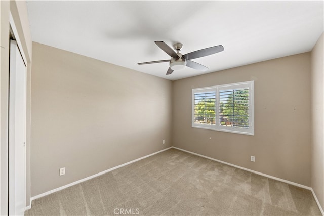24030 Colmar Ln, Murrieta, CA 92562 - unfurnished bedroom featuring light colored carpet, a closet, baseboards, and a ceiling fan