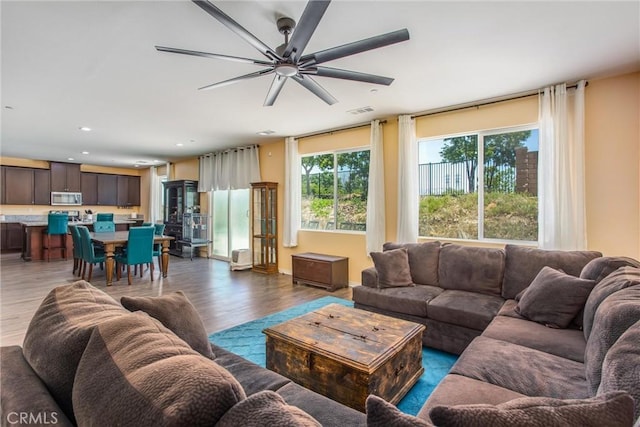 11294 Chappell Way, Beaumont, CA 92223 - living area with wood finished floors, ceiling fan, and recessed lighting