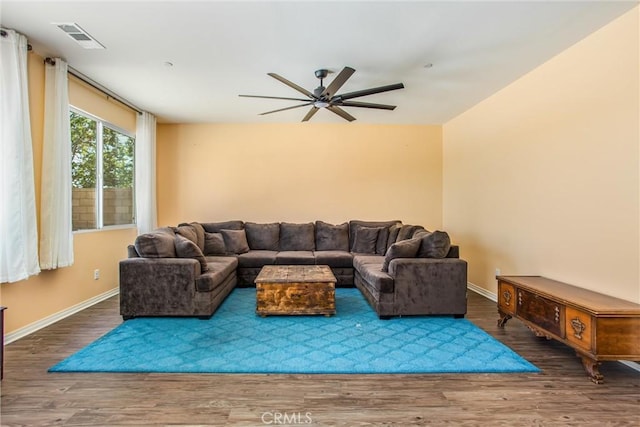 11294 Chappell Way, Beaumont, CA 92223 - living area with ceiling fan, wood finished floors, and baseboards