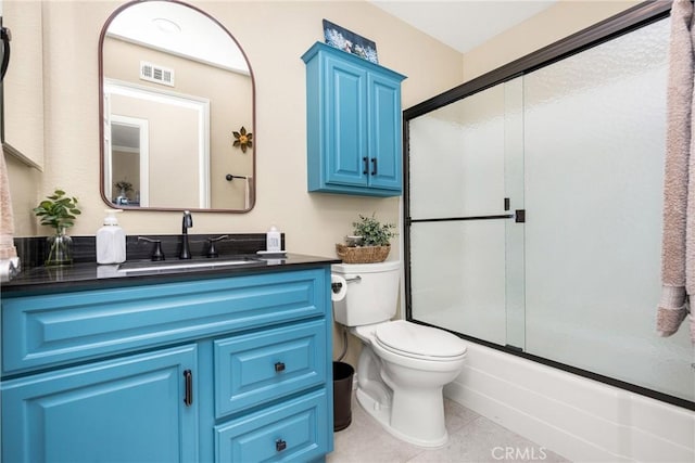 293 N Paseo De Juan, Anaheim Hills, CA 92807 - full bath featuring tile patterned floors, toilet, vanity, and bath / shower combo with glass door