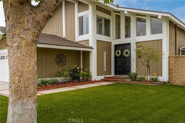 293 N Paseo De Juan, Anaheim Hills, CA 92807 - view of front of house featuring roof with shingles, french doors, a front lawn, and brick siding