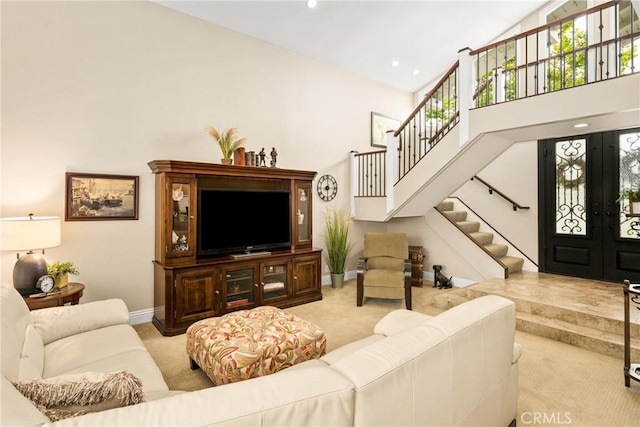 293 N Paseo De Juan, Anaheim Hills, CA 92807 - living area with carpet floors, high vaulted ceiling, stairs, french doors, and baseboards