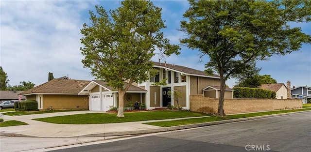 293 N Paseo De Juan, Anaheim Hills, CA 92807 - view of front of house featuring concrete driveway, a garage, and stucco siding
