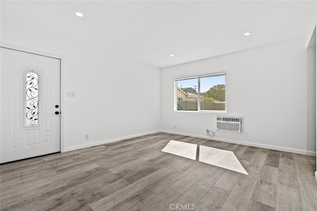 142 S Savannah St, Los Angeles, CA 90033 - foyer entrance featuring a wall mounted air conditioner, wood finished floors, recessed lighting, and baseboards