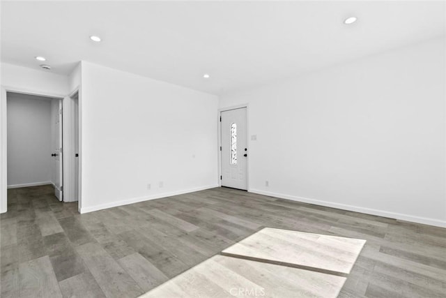 142 S Savannah St, Los Angeles, CA 90033 - unfurnished room featuring wood finished floors, recessed lighting, and baseboards