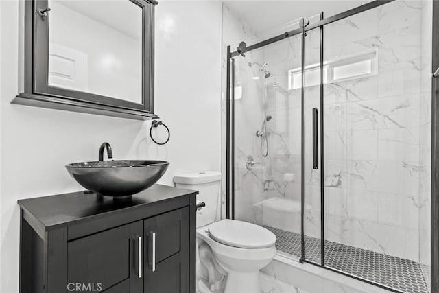 142 S Savannah St, Los Angeles, CA 90033 - bathroom with marble finish flooring, toilet, a marble finish shower, and vanity